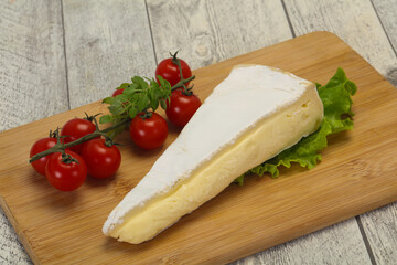 Brie cheese triangle served salad