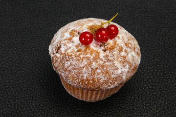 Sweet tasty muffin with red currants