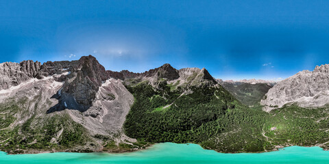 Naklejka na ściany i meble A lake into the mountain - Italy
