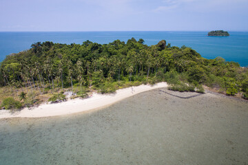 aerial view of a tropical island in Thailand with white sand beach