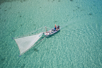 small boat shrimp fishing in Thailand, aerial view