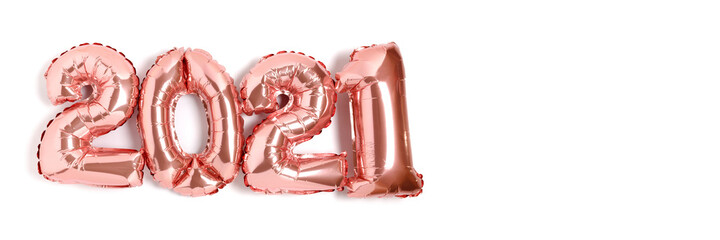Banner with 2021 made from rose gold color balloons isolated on a white background with copy space.
