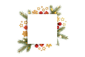 Fototapeta premium Square paper card mockup with frame made of Christmas decorations and spruce branches. Festive template on a white background.