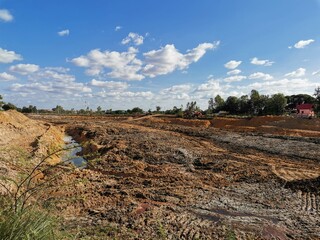 Naklejka premium Dredging a well in the dry season
