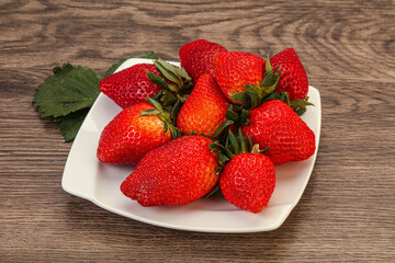 Ripe sweet strawberry with leaf