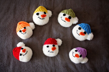 Sweet handmade snow heads in the colors of rainbow
