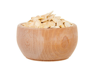 Pumpkin seeds in wooden jar isolated on white background.
