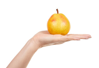 Hand with fresh yellow pear isolated on white background.