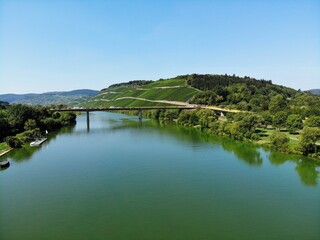 Fototapeta na wymiar The beautiful River Moselle, Mosel in Germany during summer. The Area where the good Wine comes from with all the grapeyards.