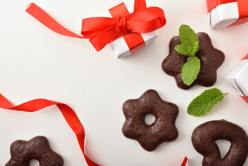 Cookies dipped in chocolates with gifts top view