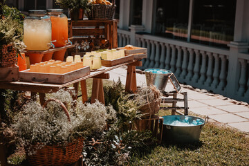 Decorated shelf where the drinks were for the guests of a wedding.