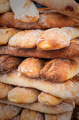 Fototapeta na wymiar Hand made fresh bread loaves on sale at an Artisan market in England