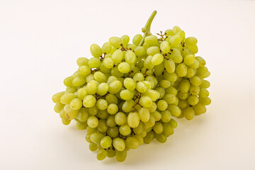 Green grape branch over background