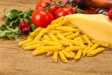 Raw penne rigate for cooking