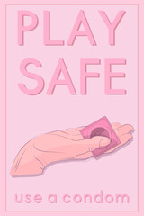 contraception concept pink greeting card, male hand gives condom and slogan play safe use a condom