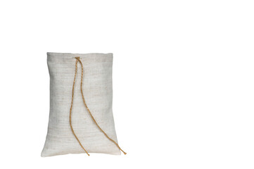 Pouch made of white linen fabric with ties cut out on a white background. The concept of natural materials
