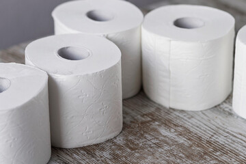 A group of white toilet paper rolls