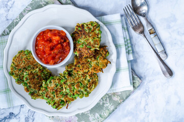 Courgette and green peas fritters