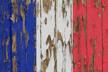 Flag of France on a weathered wooden wall