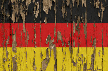 Flag of Germany on a weathered wooden wall