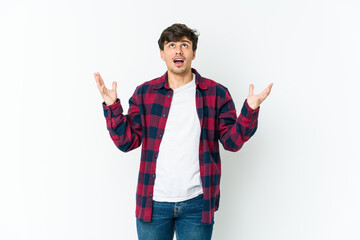 Fototapeta premium Young cool man screaming to the sky, looking up, frustrated.