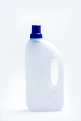 White Detergent plastic bottle with chemical cleaning product isolated on white background.