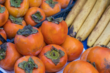 Orange palm fruit at the farmers market.