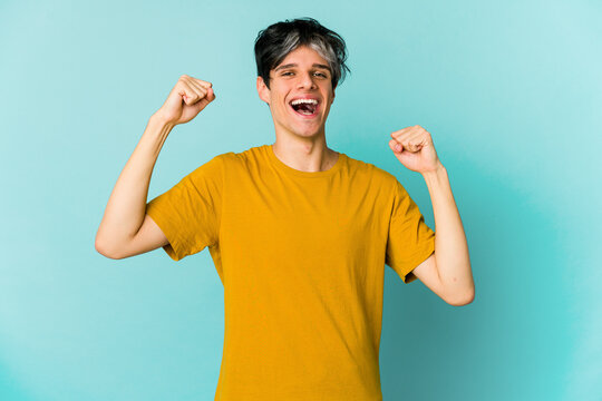 Young caucasian skinny man expressing emotions isolated on blue background