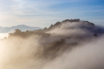 Beautiful nature in the morning mist on the high mountain peaks of southern Thailand at Khao Khai Nui.