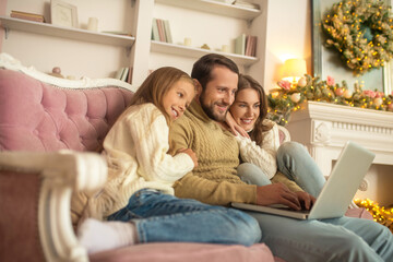 Young family spending holdiday togather and looking happy