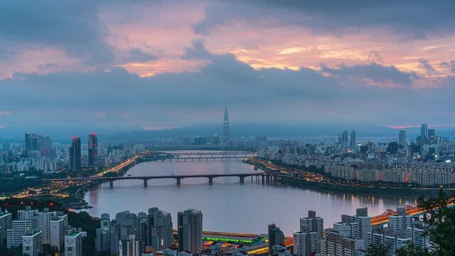 Time lapse 4k Sunrise of Seoul city at han river in South Korea.