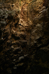 Inside a dark rock cave