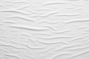 Fototapeta premium Blank white crumpled and creased paper poster texture background