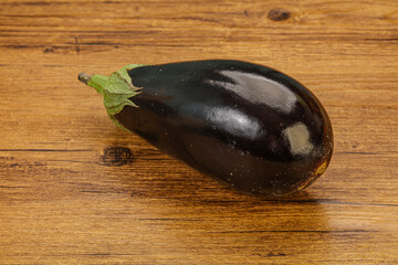 Black ripe fresh eggplant over background