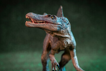 plastic statuette of velociraptor studio shot