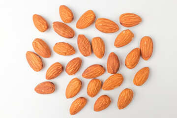 Savory almonds on white background