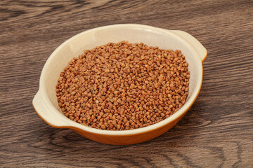 Raw buсkwheat cereal in the bowl