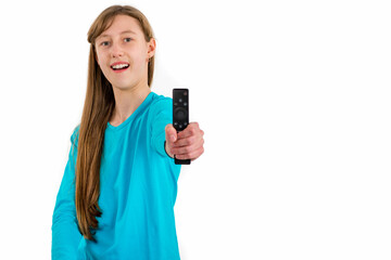 Girl kid child holds tv remote control.White studio wall.Close up.