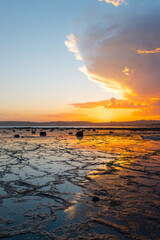 Fototapeta na wymiar Silhouette of beach reef at sunset time.
