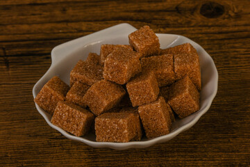 Cane sugar cubs in the bowl