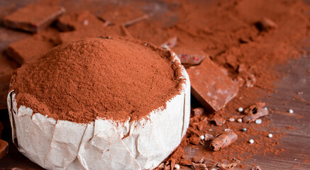 Organic cocoa cacao powder for food snack tasty sweet dessert milk dark chocolate drink bakery macro closeup broken slide piece cookie  cake hazelnut nuts for new year Christmas gift