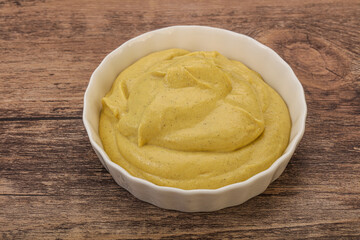 Dijon mustard sauce in the bowl