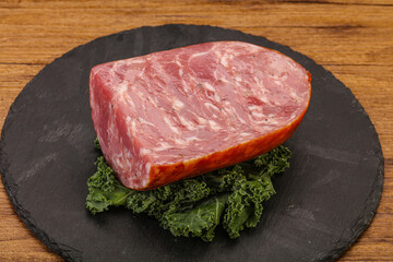 Beef ham piece over board