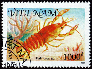 Obraz premium Postage stamp Vietnam 1991 palinurus, shellfish