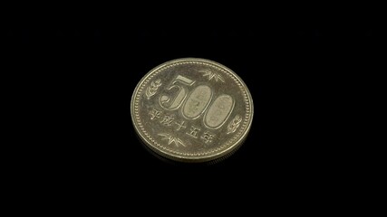 Japan 500 Yen coin macro isolated shot. Coined in Heisei 15 or 2003