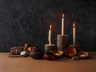 Spa wellness zero waste concept, natural wooden candle holders, coconut shells, peeling sand stone coffee scrub, sea salt, eco friendly wood haircomb. Clean exfoliation products relaxation massage set