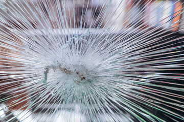 Stockholm Sweden  A burglarized and cracked window in a store.