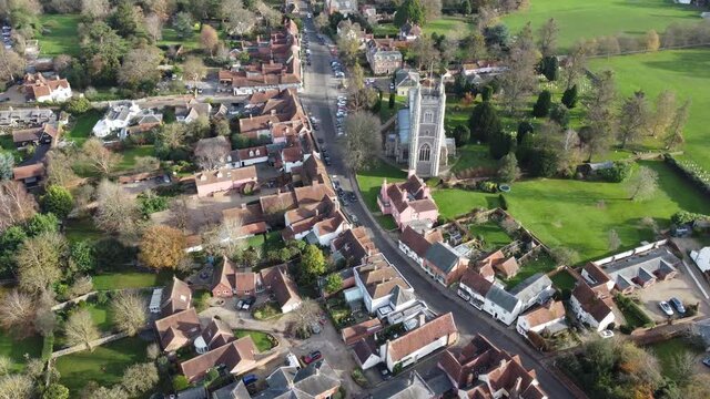 A drone flight over Dedham on the Essex/Suffolk border panning from the left to the village and church on the right with views of the whole village and surrounding countryside.