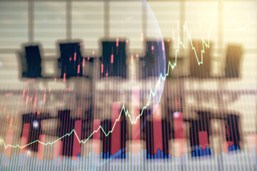Multi exposure of virtual abstract financial graph hologram and world map on a modern furnished classroom background, financial and trading concept