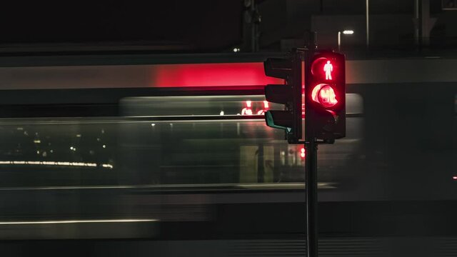 Changing Traffic Lights On Busy Road At Barcode District In Oslo At Night - time lapse, zoom-in